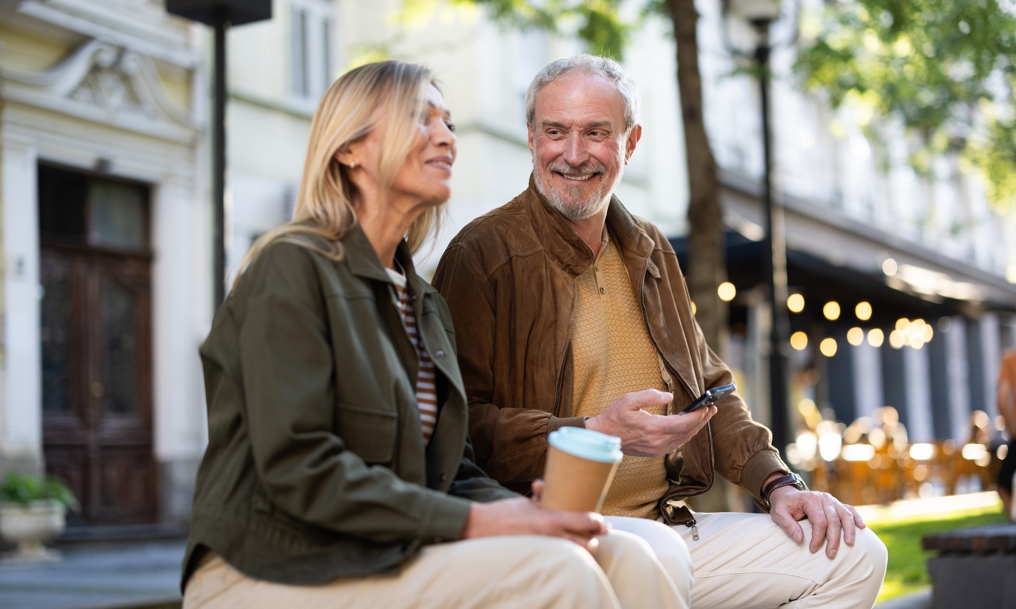 Senior couple sitting on bench